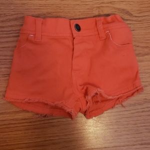 Orange denim shorts